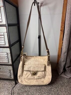 Coach Penelope soho hobo Signature-Pattern Shoulder Bag with Front Flap Pocket